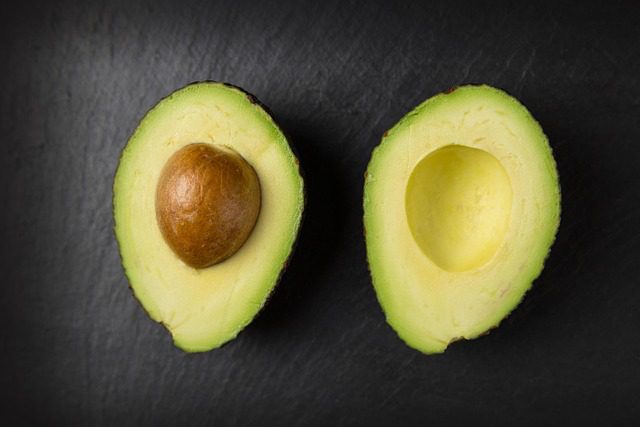 Avocado halves - healthy fat source and superfood for weight loss