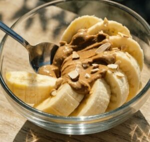 Banana with almond butter as a healthy late night snack for better sleep and relaxation